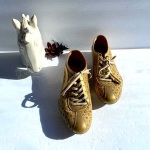 🥿Pre Loved Salvatore Ferragamo Gold Monogram Sneakers